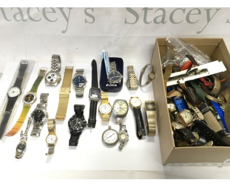 A box of mixed watches including pulsar Accurist Swatch D&G etc Postage B
