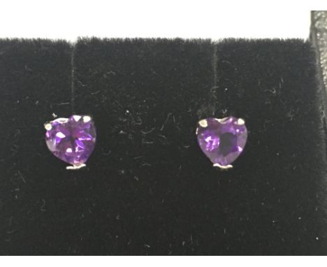 18ct white gold studs set with heart shaped amethyst which are 1.30ct. Postage B