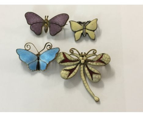A Collection for enamel and dragonfly brooches.