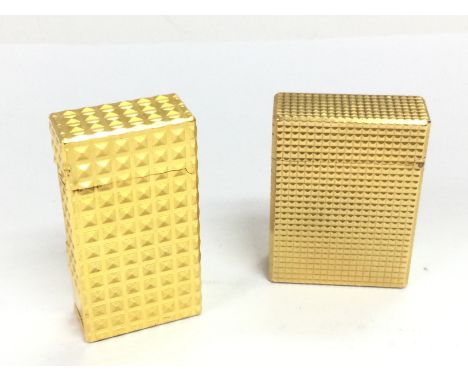 A DuPont and Vinci lighter. Postage category A