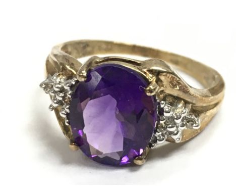 A 9 carat gold amethyst ring , 3.5g total weight. Size Q. Postage category A