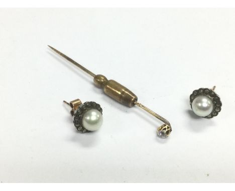A pair of gold and pearl stud earrings and 0.15ct diamond stick pin. Shipping category A. NO RESERVE
