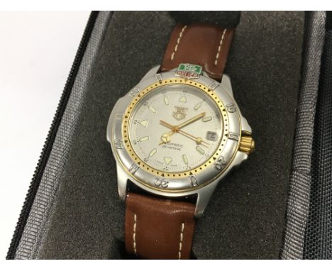 a Tag Heuer automatic 200 metres mens watch with a leather strap. Seen working Postage category A