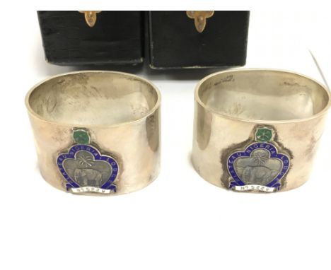Two silver masonic and enamel Nigeria napkin rings with box. Circa 1931. 122.8g total. Postage B