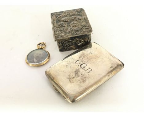 A 9carat gold double sided portrait pendent a silver match holder and small silver box (3)
