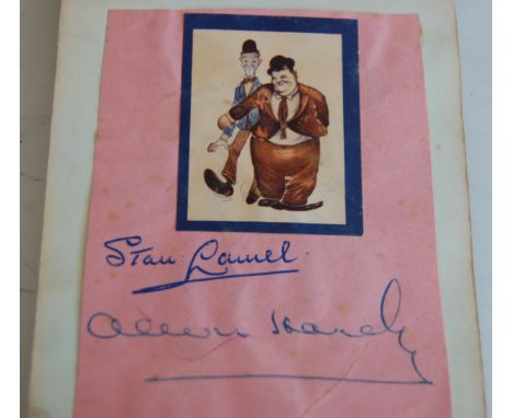 Autograph book containing approx 50 autographs, to include Laurel & Hardy, Peter Sellers, Michael Bentine, Al Martino, Des O'