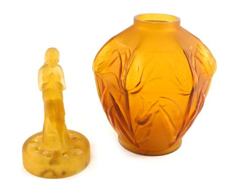 A French amber glass vase, of hexagonal form, with moulded thistles, 18cm high, and a frosted amber glass centrepiece, 16cm h