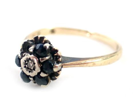 A 9ct gold dress ring, set with sapphire and diamond in a floral cluster, one stone missing, ring size M½, 2.1g. 