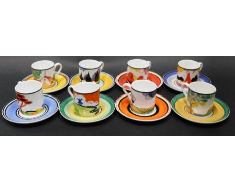 A set of eight Wedgwood Centenary Clarice Cliff coffee cans and saucers, each in multicoloured design, with associated saucer