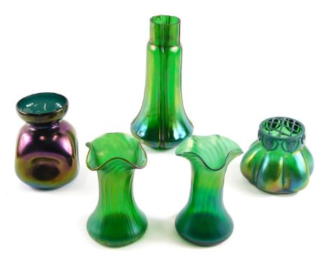 A group of iridescent glass, comprising a pair of flared rim vases, 13cm high, a domed glass vase, 12cm high, and two others.