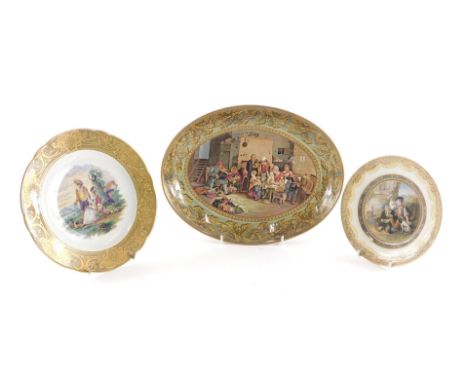 A 19thC Prattware oval dish, printed with the Blind Fiddler, after Sir David Wilkie R.A, and two similar plates. (3) 