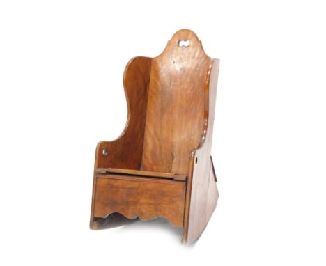 An early 19thC mahogany child's rocking and commode chair. 