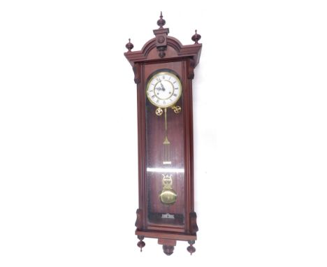 A 19thC style mahogany cased Vienna wall clock, circular brass dial with enamel chapter ring bearing Roman numerals, eight da