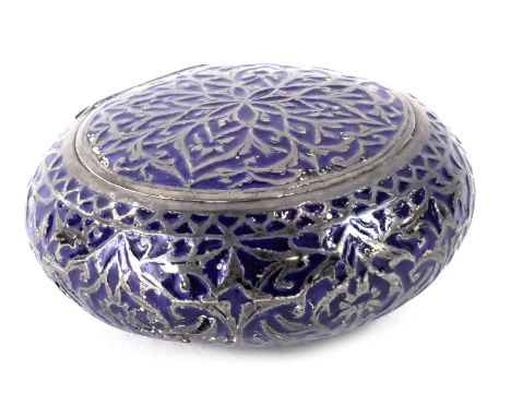 An Eastern silver coloured metal and blue enamel trinket box, the blue enamel within wire work white metal border, with a gil