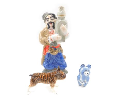 USSR and other porcelain, comprising a blue panda, brown bulldog, and a gentleman carrying oriental vase, the largest, 33cm h