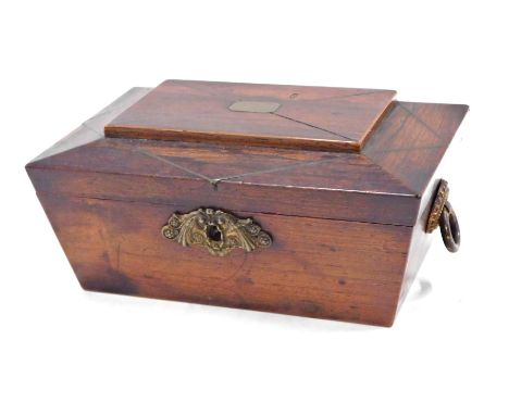 A 19thC mahogany sarcophagus shaped sewing box, two step top with brass bound inlay, opening to reveal a purple cushion lined