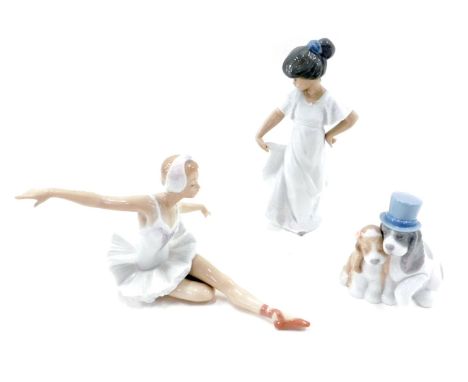 Three Nao figures, comprising girl with flowing dress, seated ballerina, and bride and groom pup. (3) 