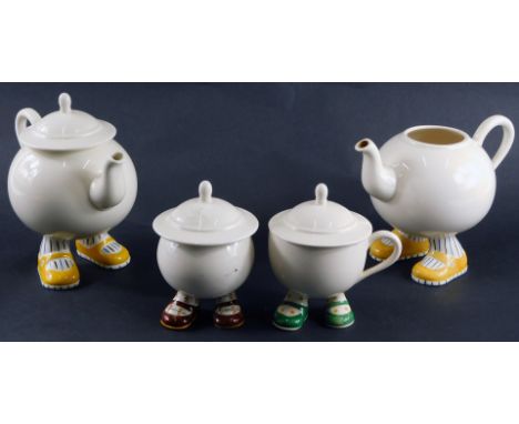 Carltonware walking ware two cups and covers, two teapots, the teapot, 16cm high, the cups, 9cm high, with one additional cov