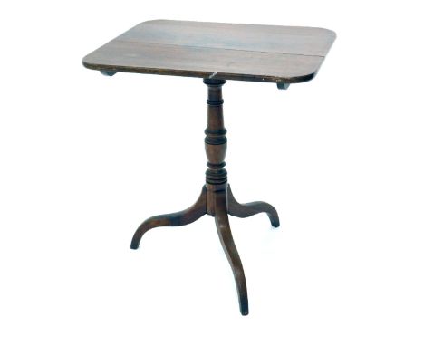 An early 19thC oak tilt top table, with tripod base, 72cm high, the top 64cm x 53cm. 