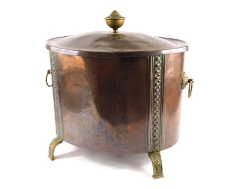 A 20thC copper coal basket, with an acorn and sunflower finial, on Art Nouveau out shaped legs with two swing handles, of ova