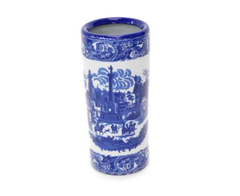 A reproduction blue and white porcelain stick stand, transfer decorated with classical buildings and figures, within floral b