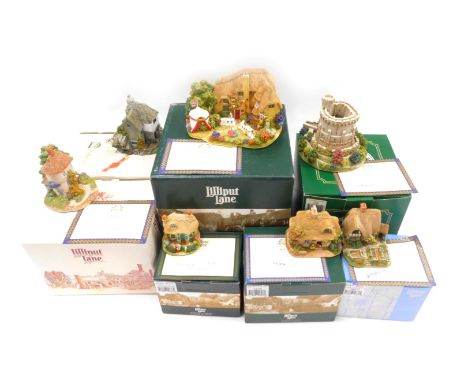 Seven Lilliput Lane cottages, comprising The Golden Jubilee, Welcome Gnome, Birthday Cottage, Round Tower Windsor, Cabbage Pa