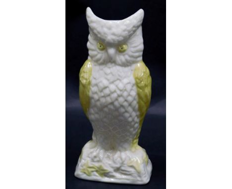 A Belleek porcelain vase, modelled as an owl, with yellow lustre wings and eyes, brown mark, 31cm high. 