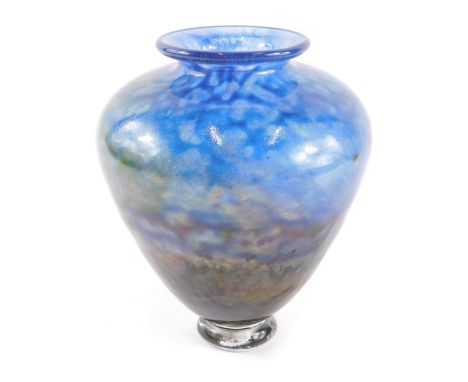 An Adam Aaronson Tin Mill Studio of London Art Glass vase, on a blown blue and brown mottled design, on stepped foot, signed,