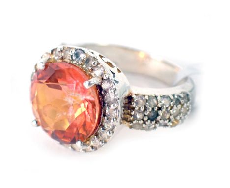 A padparadscha quartz and white topaz dress ring, of chunky design, white metal stamped 925, ring size N, 6.1g all in, boxed.