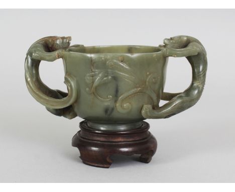 ANOTHER GOOD CHINESE DARK GREEN JADE CHILONG TWO-HANDLED CUP, possibly 17th/18th Century, together with a fitted box and fitt