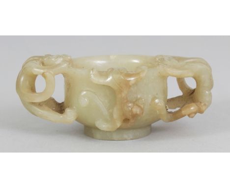 A GOOD CHINESE CELADON JADE CHILONG TWO-HANDLED CUP, possibly 17th/18th Century, together with a fitted box, the jade carved 