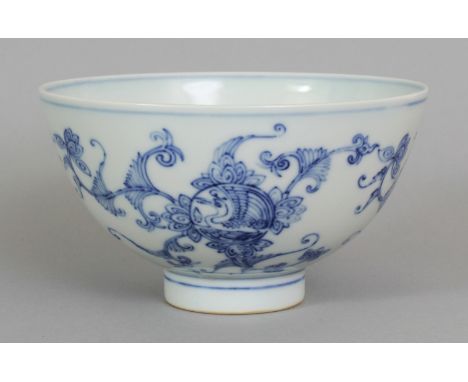 A GOOD QUALITY BLUE & WHITE PORCELAIN BOWL, decorated with repeated phoenix and lotus motifs, the base with a six-character K