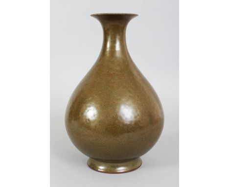 A CHINESE TEA DUST GLAZED YUHUCHUNPING PORCELAIN VASE, applied with a mottled glaze, the base with a Qianlong seal mark, 11.3