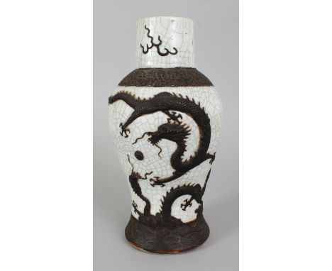 A CHINESE CRACKLEGLAZE PORCELAIN DRAGON VASE, circa 1900, decorated with a dragon in raised brown unglazed relief against a w