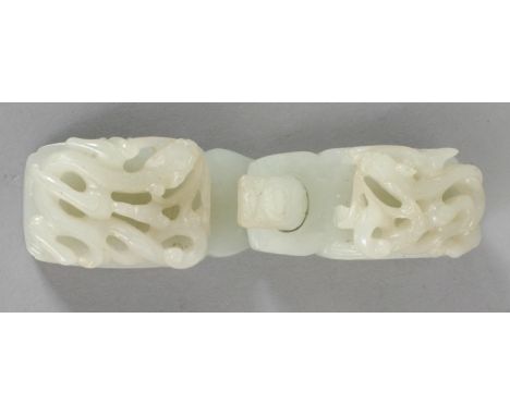 A GOOD QUALITY 18TH/19TH CENTURY CHINESE TWO SECTION JADE BELT BUCKLE, with a dragon's head hook, each piece carved in high p