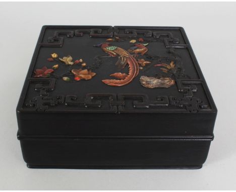 A GOOD QUALITY CHINESE MOTHER-OF-PEARL & HARDSTONE ONLAID CARVED HARDWOOD BOX & COVER, of square section, the cover decorated