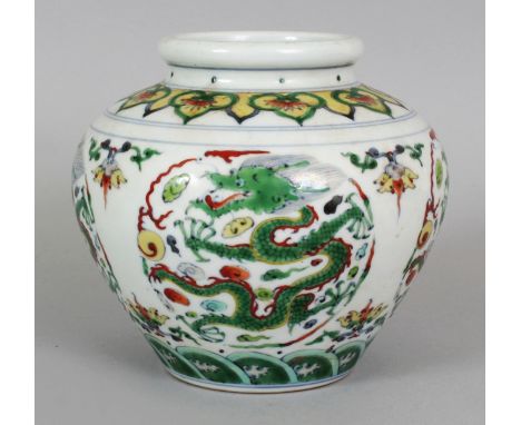 A CHINESE DOUCAI PORCELAIN JAR, the sides decorated with repeated dragon roundels, the base with a six-character Kangxi mark,