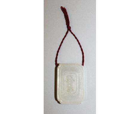 A GOOD QUALITY 18TH/19TH CENTURY CHINESE JADE BELT FITTING, carved in shallow relief to one surface with an auspicious charac