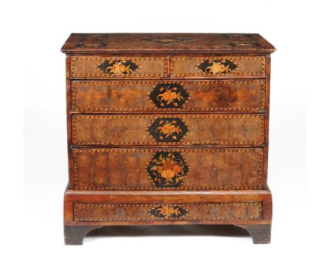A William &amp; Mary walnut and olivewood oyster veneered chest on stand, circa 1690, chevron banded throughout and incorpora