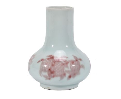 A small Chinese underglaze red 'pomegranate' vase, with apocryphal six character Kangxi mark in underglaze blue within double