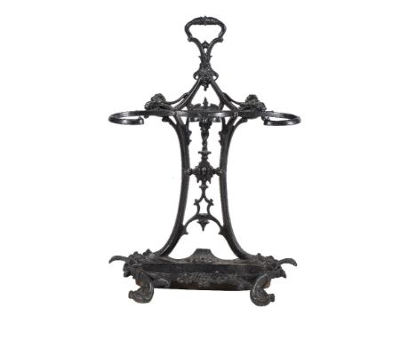 A Victorian painted cast iron stick stand in the manner of Coalbrookdale, mid 19th century, the two scrolled retaining bars i