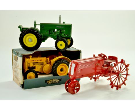 Trio of 1/16 tractor issues comprising John Deere and Cockshutt. Generally very good to excellent, one boxed. Note: We are al
