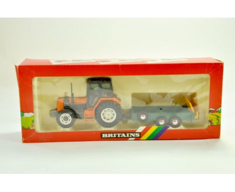 Britains 1/32 Farm issue comprising No. 9614 Renault 145-14 Tractor with Animal Trailer (note red hubs). Appears very good to