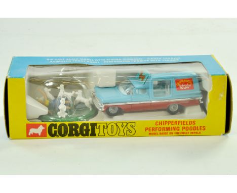 Corgi No. 511 Chevrolet Impala Chipperfield's Performing Poodles Set. Issue two-tone blue, red, chrome trim, decals, cast hub