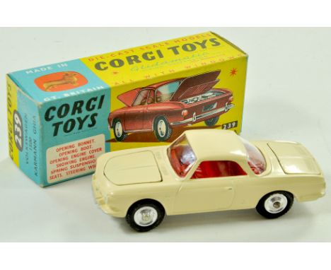 Corgi No. 239 Volkswagen 1500 Karmann Ghia. Issue has cream body, red interior, silver trim and spun hubs. Appears very good 