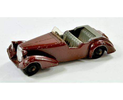 Dinky No. 38d Alvis. Issue has maroon body, dark grey interior and tonneau, plus black ridged hubs. Appears generally good, s