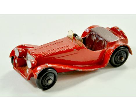 Dinky No. 38f Jaguar SS Issue has red body, maroon interior and tonneau, plus black ridged hubs. Appears generally good, some