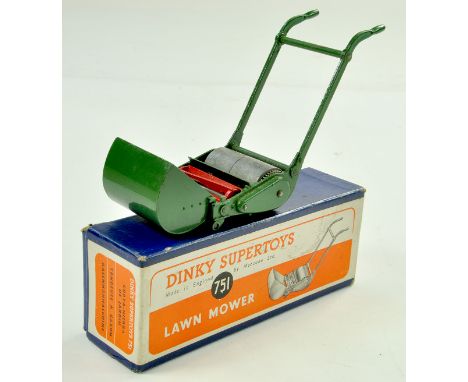 Dinky No. 751 Lawn Mower. Appears very good to excellent in very good to excellent box. Nice example.  Note: We are always ha