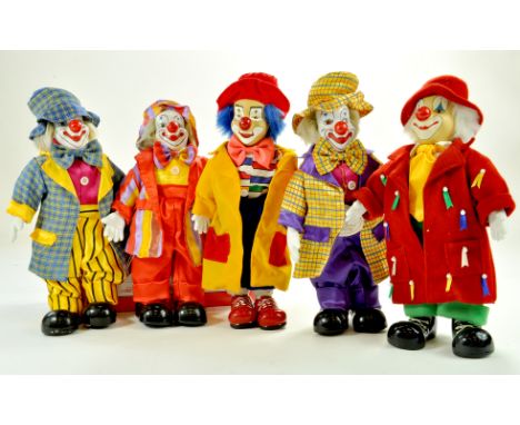 An attractive and bright group of Bisque Clown Dolls - Figures. Appear Excellent.  Note: We are always happy to provide addit