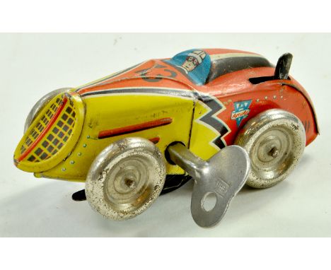 Arnold Vintage No. 13 Sparking, Turning, Clockwork Race Car 3 3/4". Bright issue is good to very good.  Note: We are always h
